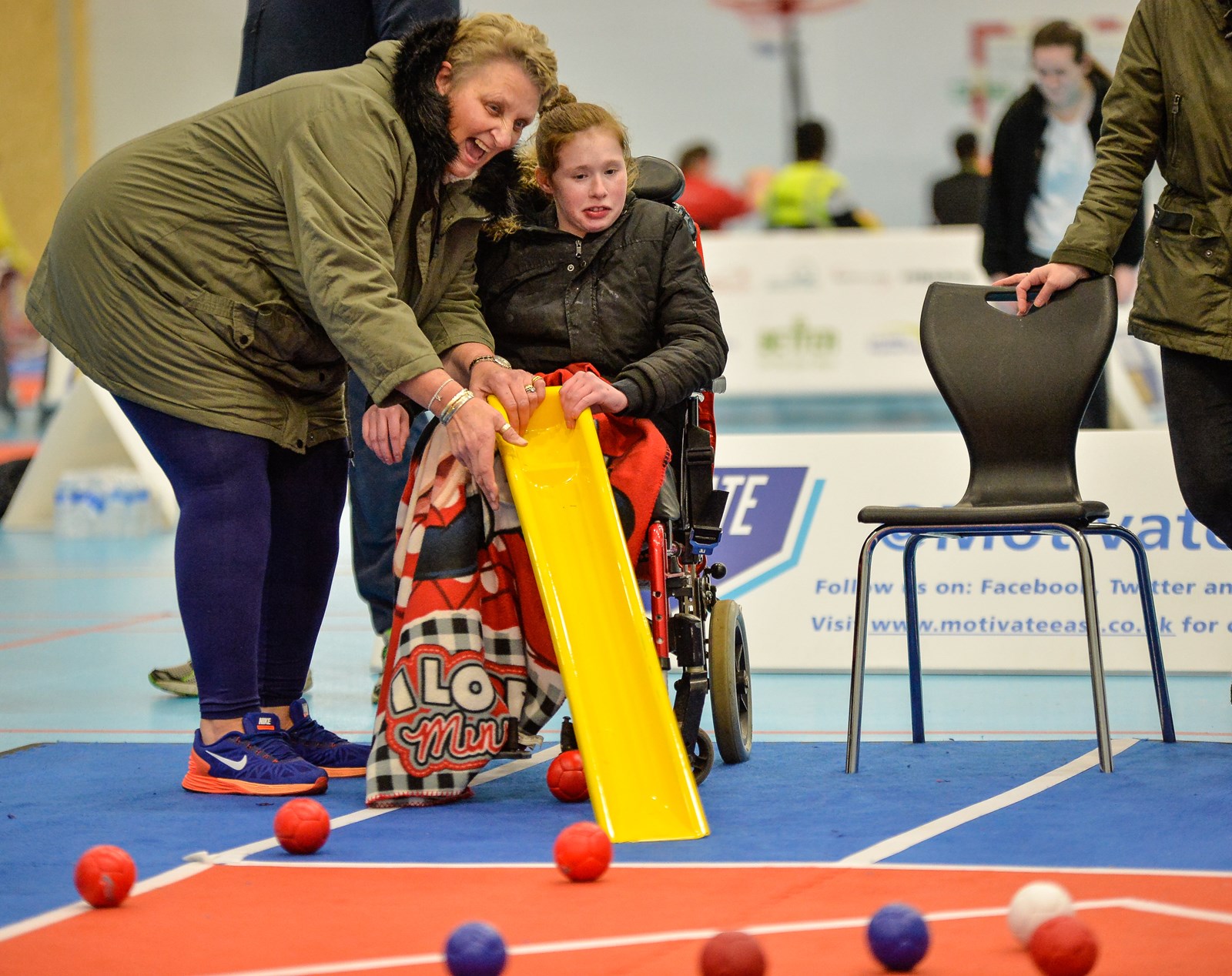 Boccia girl with supporter