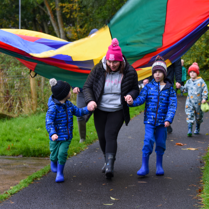 A family taking part in a sensory mile.